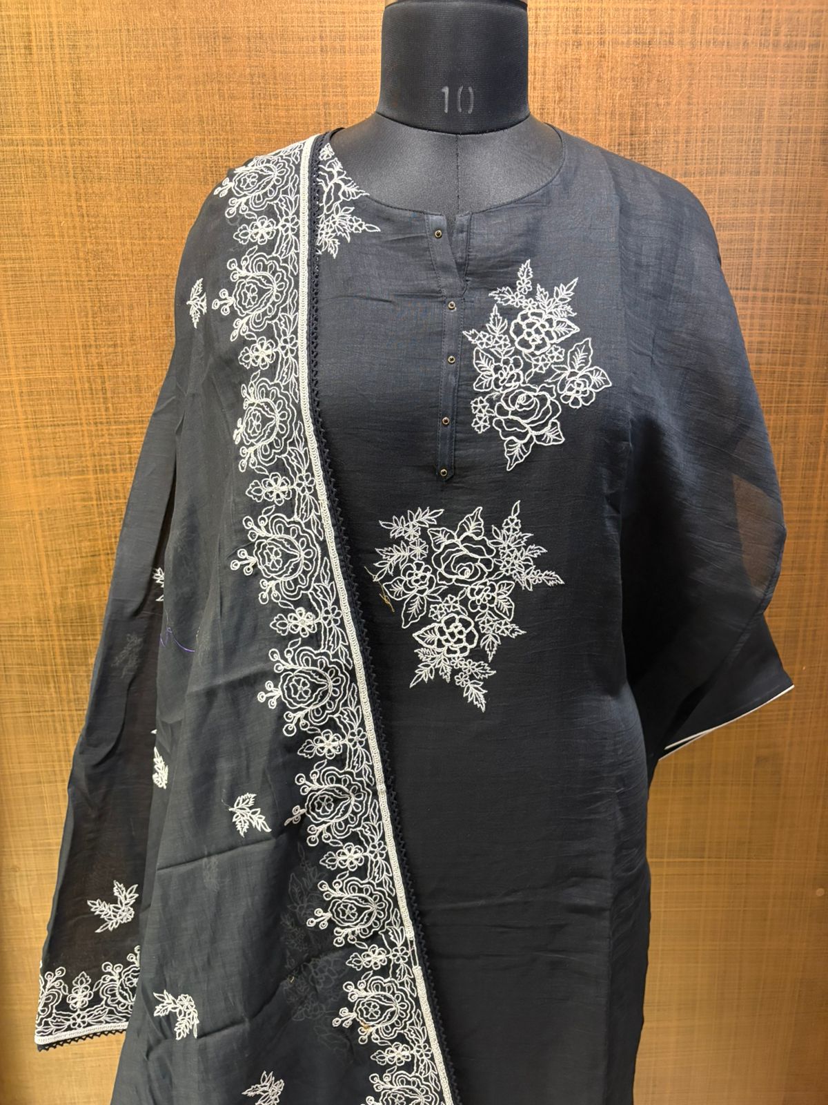 Black mul suit with white thread work