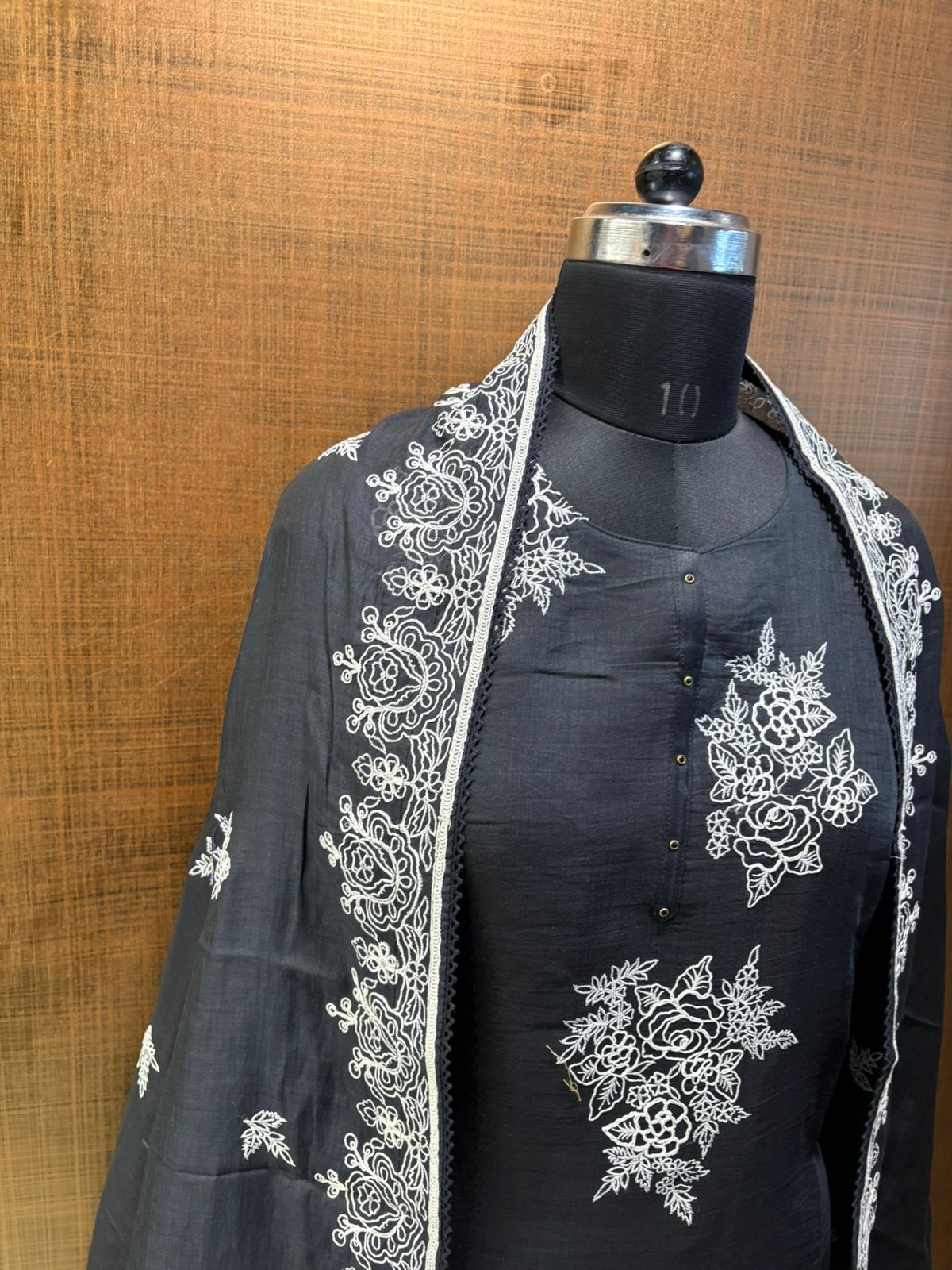 Black mul suit with white thread work