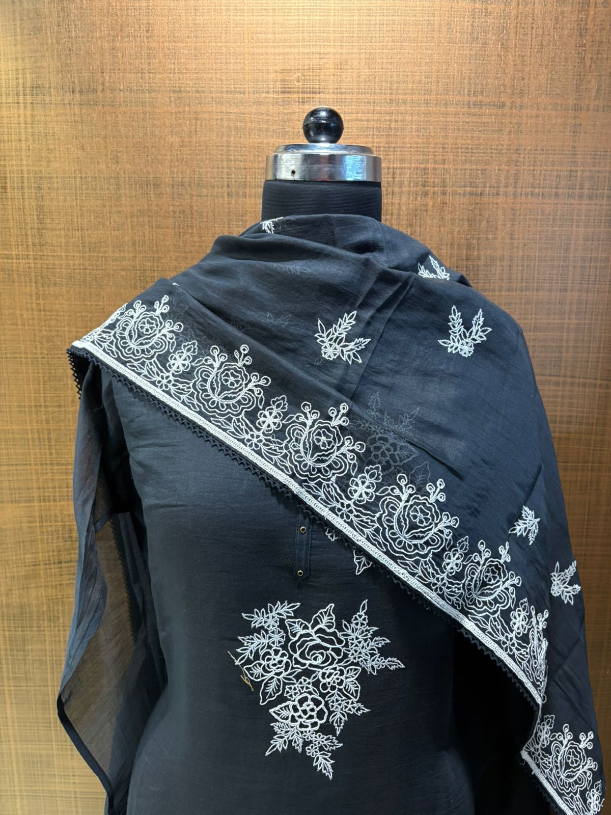 Black mul suit with white thread work