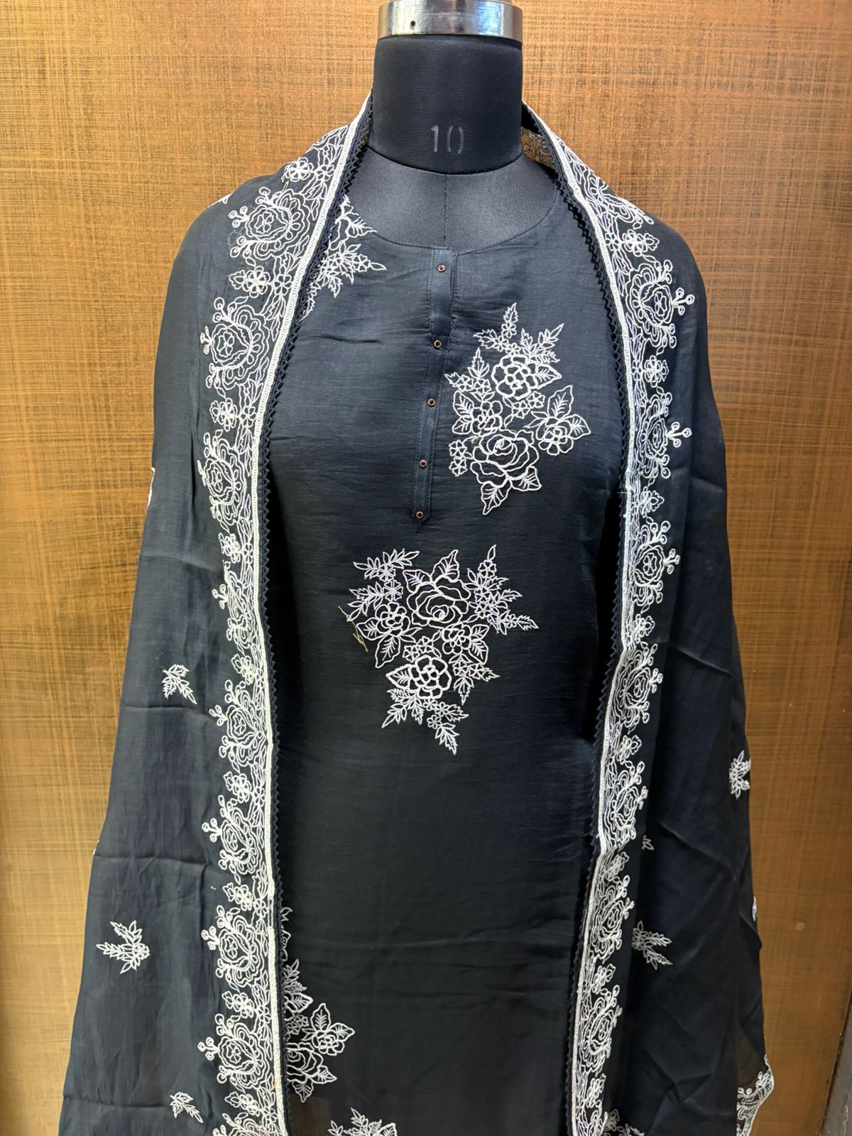 Black mul suit with white thread work